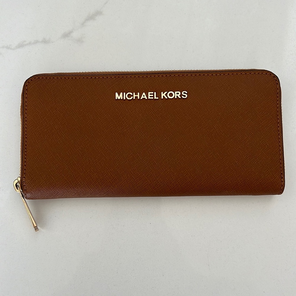 Authentic Michael Kors zip around accordion wallet luggage color